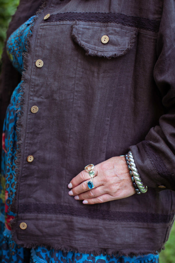 Taleeta - Stone Jacket - Blue Hibiscus Jungle Dress - Facing Front Left - Midway Closeup Shot
