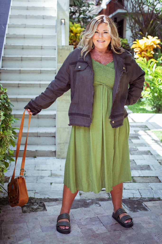 Taleeta - Stone Jacket - Leaf Dress & Leather Bag  - Facing Front - Arm Stretched - Fullshot