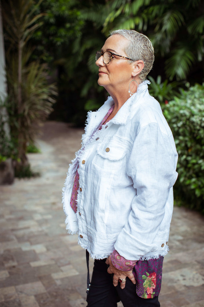 Taleeta - White Jacket - Purple Hibiscus Jungle Blouse & Indigo Cotton Pants - Facing Left Side - Medium Fullshot