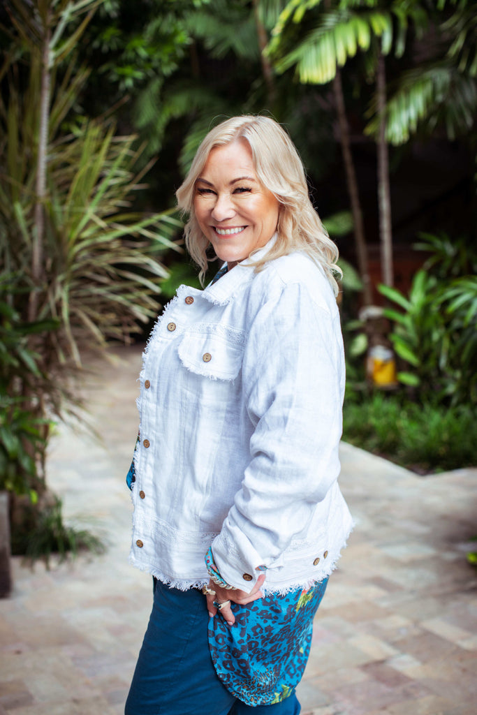 Taleeta - White Jacket - Blue Hibiscus Jungle Blouse & Blue Cotton Pants - Facing Left Side - Medium Fullshot